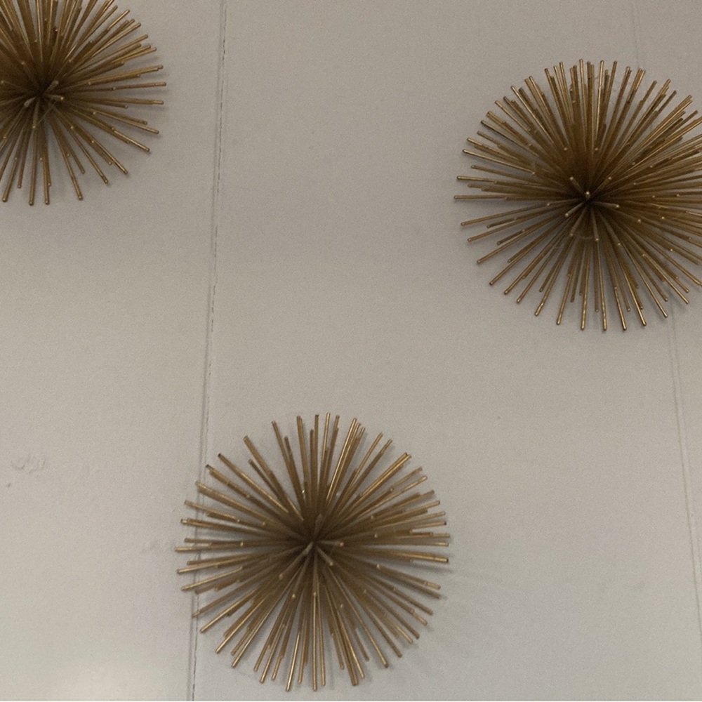 Gold metal wall art